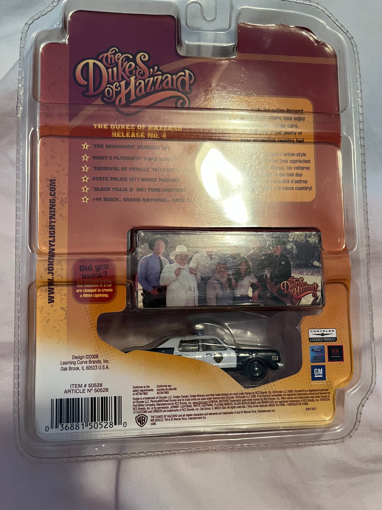 1:64 Staatspolitie 1977 Dodge Monaco Johnny Lightning