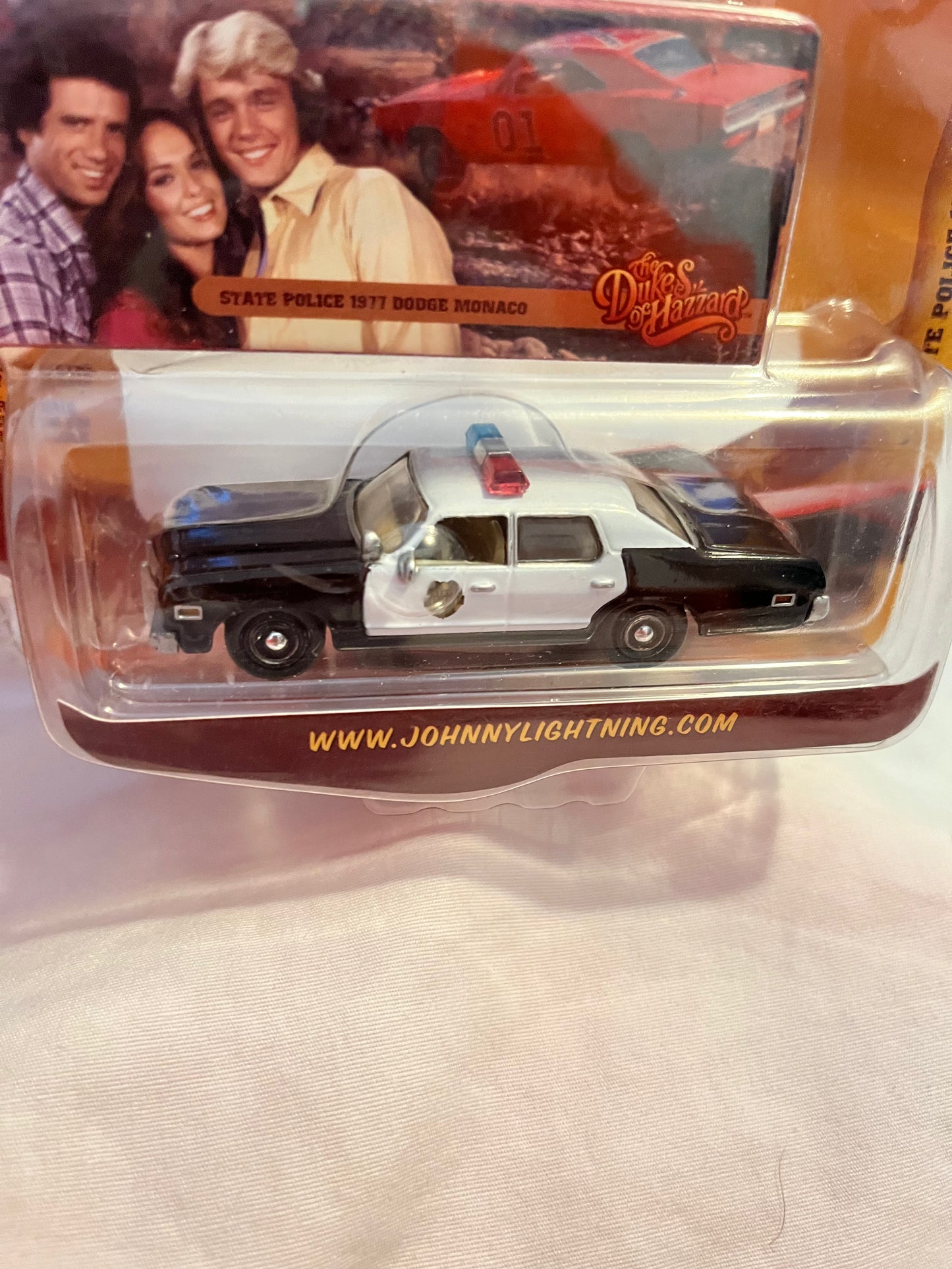 1:64 Staatspolitie 1977 Dodge Monaco Johnny Lightning